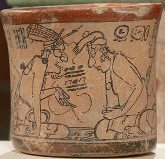 Vaso de cerâmica com inscrições e desenhos