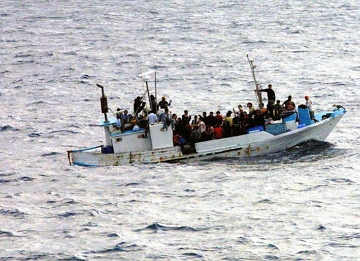 Foto de refugiados num barco