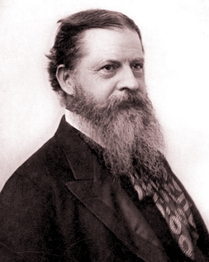 Foto do filósofo Charles Sanders Peirce, homem branco, de meia idade e barba grande