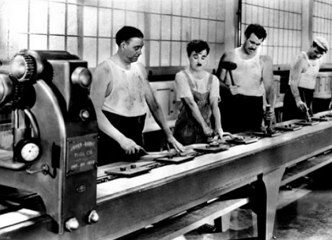Tempos Modernos de Charles Chaplin Imagem de uma cena do filme Tempos Modernos de Charles Chaplin