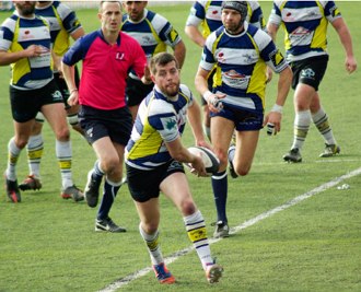 Foto de jogadores de rugby numa partida