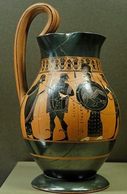 Vaso de cerâmica com alça, preto e amarelo com pinturas de figuras humanas