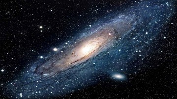 Via Láctea Imagem da Via Láctea em formato de disco com grande quantidade de estrelas
